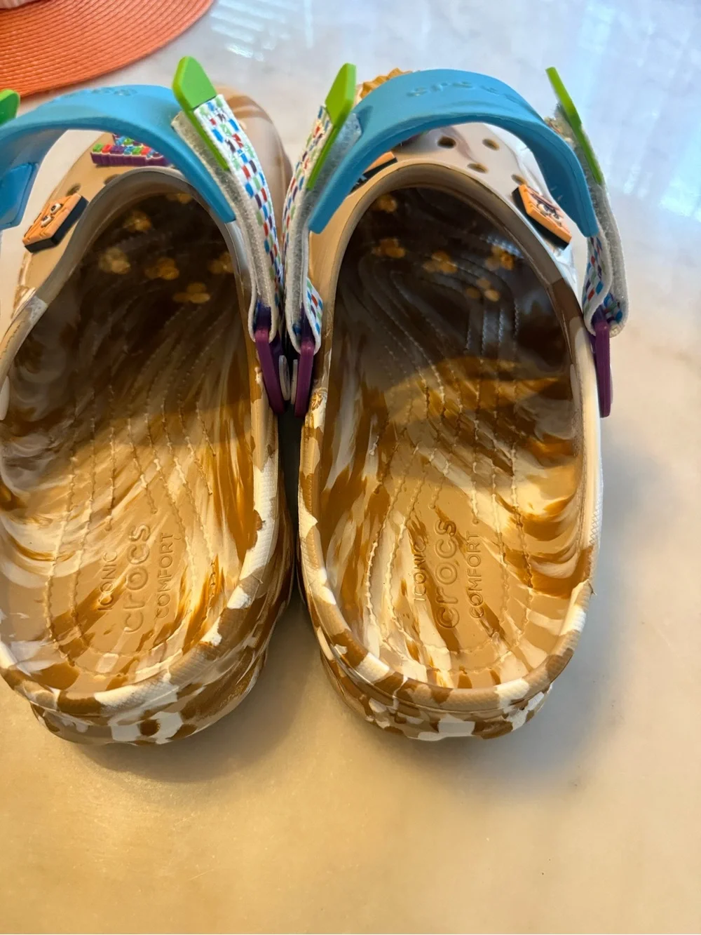 CROCS Beige Marbled Clog with Bright Blue Strap and Multicolor Charms